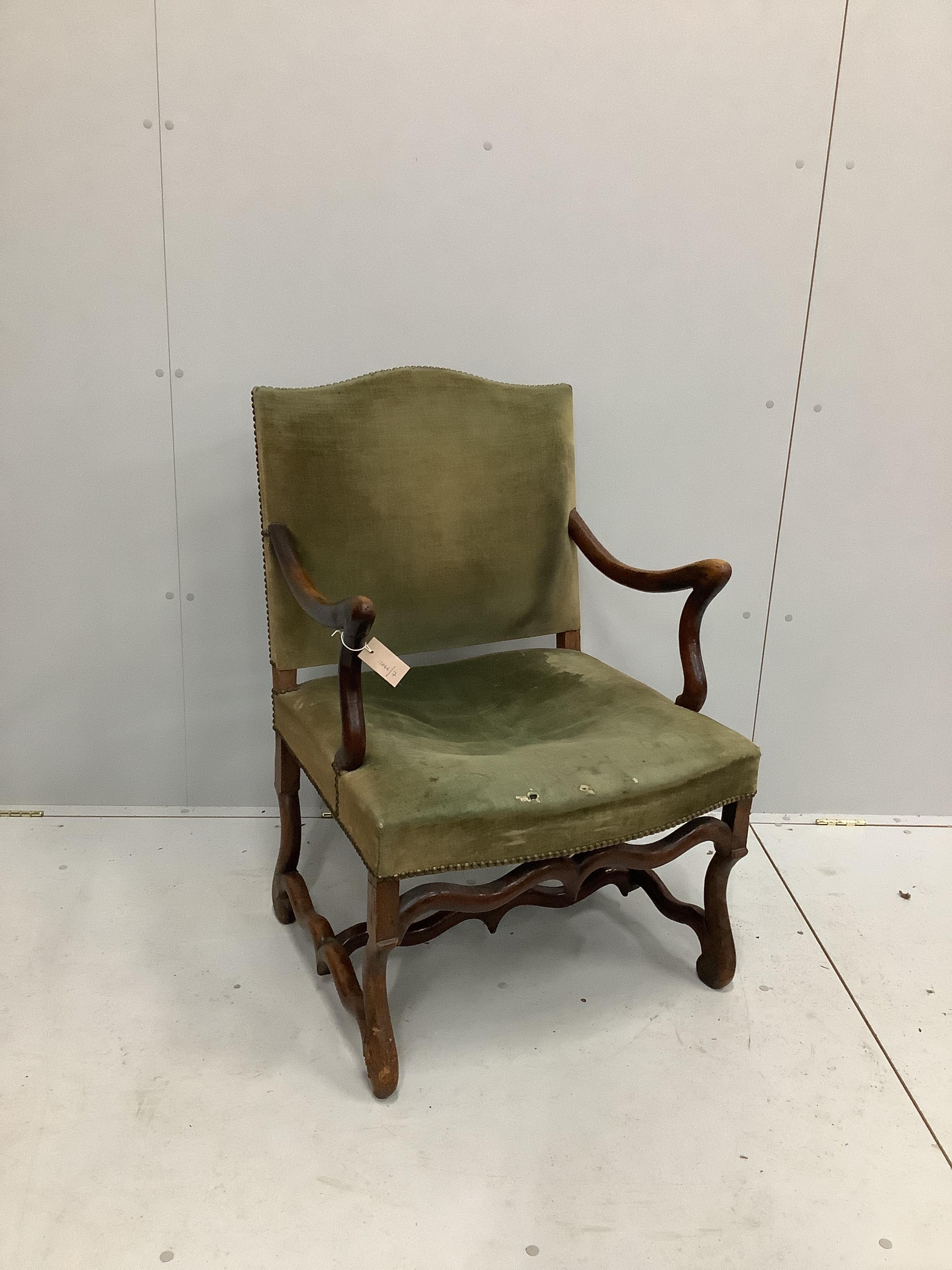 An 18th century French walnut elbow chair, width 63cm, depth 57cm, height 95cm